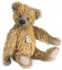 She has been made from quality mohair, has toy safety eyes and feet, ears and nose made from new socks. Hermann Antique Bear Brass Miniature Mohair Teddy Bear 16233
