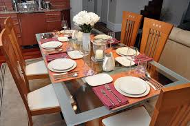 To set a casual table, you'll need a place mat, dinner plates, soup bowls, salad plates, napkins, dinner forks, knives, soup spoons, water glasses, and wine glasses. Orange Mat Casual Dinner Table Diy Table Settings Dinner Table Setting