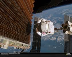 Guy Working On The Iss From National Geographic Space Station International Space Station Nasa Images