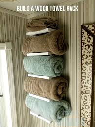 Build A Diy Towel Storage Featuring Designs By Studio C Free And Easy Diy Project And Furniture Plans Towel Holder Diy Diy Towels Towel Holder Bathroom