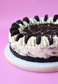 Make your crust by mixing the butter and crushed oreos together well. No Bake Oreo Cheesecake Sweetest Menu
