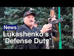 Kurtz from apocalypse now (or presumably kurtz from the novel heart of darkness. Belarus Lukashenko Brandishes Rifle During Mass Opposition Rally The Moscow Times