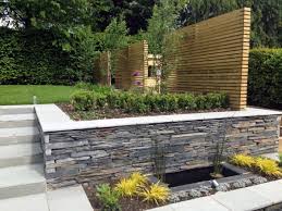 The wall and garden path are crafted of valders stone. Pin On Retaining Wall