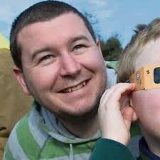 Awed onlookers over the moon with stunning eclipse