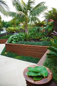 Raised Garden Bed And Retaining Walls Gardening Trips Tropical Garden Design Tropical Backyard Tropical Landscaping