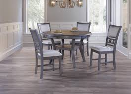 Available in a range of sizes, our kitchen and dining room tables can seat as few or as many as you like—from the cozy table tucked in the corner of your kitchen to the extension table with leaf that easily seats up to ten guests. New Classic Furniture Gia Round Dining Table 4 Chairs Great American Home Store