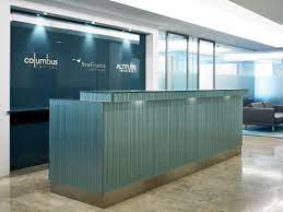 Modern open office with reception and glass partition. Creative Float Glass Design For Architects And Textured And Creative Glass Applications