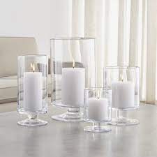 Maybe order large quantities online and have them shipped to the store instead. London Glass Hurricane Candle Holders Crate And Barrel Glass Hurricane Candle Holder Hurricane Candles Glass Candle Holders