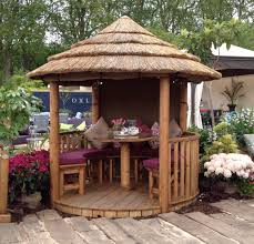The Mara Breeze House The Original As Seen T Chelsea Flower Show 2016 Timber Garden Building With Thatch Roof Garden Design Garden Huts Small Backyard Ponds