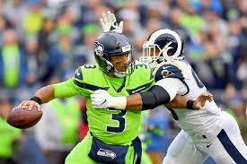 He later worked in construction, delivered phone books and recycled tires, piecing together odd jobs in order to make ends meet. Seahawks Russell Wilson Throws Rams For A Loss With Four Tds Los Angeles Times