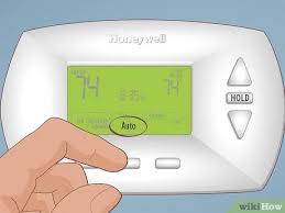 How To Override The Programing On Honeywell Thermostat - Youtube