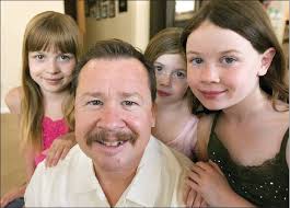 Firefighters pull together to help a comrade in his fight against cancer