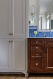 A bright blue, brown and white bathroom for a contemporary look and brightness. Blue And Brown Bathroom Design Ideas