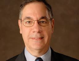 Long CBS Career Adds Up for Kaplan