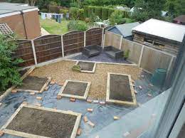 What color gravel will work well with your garden and existing hardscape? New Oak Railway Sleepers Raised Bed Gravel Garden