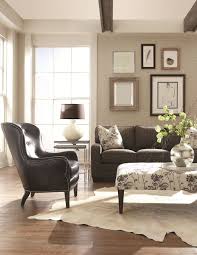 Great Furniture Mix Added Texture With The Rug And A Gallery Wall Adds Interest Schneiderman S Furniture Leat Furniture Living Room Leather Beautiful Sofas