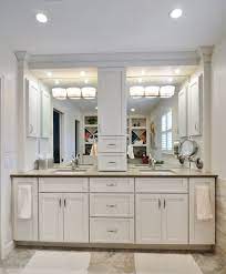 A double vanity also offers drawers for storage. Bathroom Cabinets With Center Storage Tower Google Search Bathroom Vanity White Vanity Bathroom Bathroom Tower