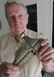 A World War II veteran leads the parade, along with his guests from Germany
