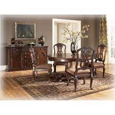 I'm in love with my dinning room set i enjoy looking at the beautiful designs and the chairs are so comfortable. D553 50t Ashley Furniture Round Pedestal Table