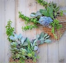 Outdoor hanging planter ideas are perfect to add a bit of color to your front porch or garden. 12 Diy Vertical Pocket Planters For Urban Homes Gardens Balcony Garden Web