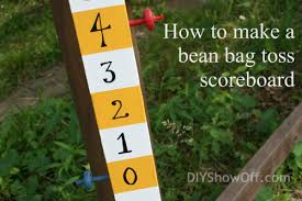 In this game, two teams throw bean bags into the holes of a goal board positioned on the ground to score points. How To Make A Bean Bag Toss Cornhole Scoreboarddiy Show Off Diy Decorating And Home Improvement Blog