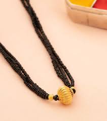 People who are new to the indian culture and traditions may not be able to understand its importance, but this is not a common jewelry like other chains or necklace.it is a sacred thread made of black beads. Buy 80 Gold Mangalsutra Designsonline P N Gadgil Sons