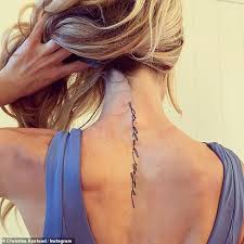 Billie eilish lyrics music video. Christina Anstead Gets Inspirational Maya Angelou Quote Tattooed Onto Her Back Post Divorce Daily Mail Online