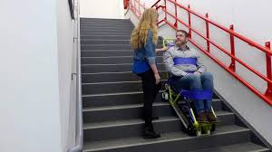 Device designed to allow a person with a mobility disability to be transported down stairs. Evacutrac Evacuation Chair Garaventa Lift