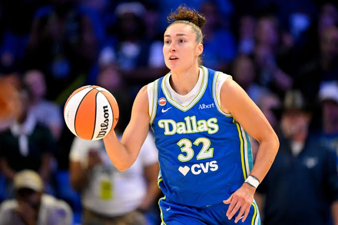 Jessica Shepard's interior dominance and relentless rebounding are crucial to the Wings' success., do AI tạo