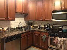 Navy subway tiles look so bold with white seams. White Subway Tile Baltic Brown Aka Tropical Brown Countertops Wit White Subway Tiles Kitchen Backsplash Diy Kitchen Remodel Backsplash Kitchen White Cabinets