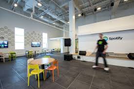 Inside Spotify S Colorful And Open Nyc Offices Office Snapshots Cool Office Space Startup Office Space Reception Design
