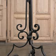 Versatile and vibrant, wrought iron table lamps are stylish accents that not only draw attention to themselves but serve to increase the function, drama, and style of a room. Country French Wrought Iron Floor Lamp