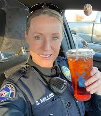 This morning when School Resource Officer Sally Miller stopped by Dutch  Bros to pick up a morning pick-me-up, she thought she was going to have to  break up a fight. But this “