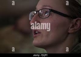 U.S. Army Sgt. Alana Fleming, a combat medic assigned to the 404th Civil  Affairs Battalion, Airborne, provides explanation of care under fire  procedures during the combat lifesaver skills course at the Base