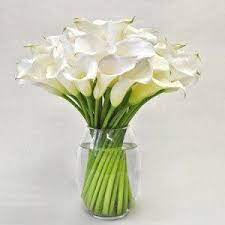 Send Perfect White Calla Lilies Great Nyc Flowers For Art Fashion Florist In Midtown Delivery Corporate Flowers Purple Flower Arrangements Office Flowers