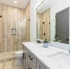 Regardless of the color scheme of your bathroom, you'll find wood tiles that work with your current color scheme and shower fixture. Wood Look Tile Archives Queen City Stone Tiles