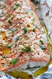 Cooking salmon in foil is a simple way to avoid washing extra dishes since the baking sheet would stay all clean. Garlic Butter Baked Salmon In Foil Recipe Little Spice Jar
