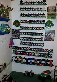 Organized Hot Wheels Monster Trucks Collection Using 97 Curtain Rods Storage Monster Truck Room Toy Room Organization Boys Bedroom Storage