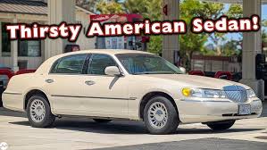 Image result for Light Parchment Gold 1999 Town Car