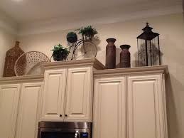 Pin By Sherrie Roetheli On New Home Decorating Above Kitchen Cabinets Kitchen Cabinets Decor Farmhouse Kitchen Decor