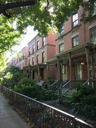 Porches On Harlem S Astor Row Beautiful Streets Nyc Neighborhoods Houses With Porches