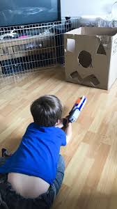 Nerf storage organization ideas for blasters accessories pin on nerf gun storage and display cabinet pin on easton 6 pin on nerf gun storage pin on organization pin on hugo the best bento box for kids dicas decoração quarto. Quick And Easy Diy Nerf Gun Target Game Lukeosaurus And Me