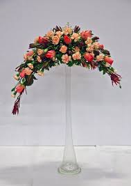 It is mason jar full of nail polish, nail files, and other things to beautify your nails. Inverted Crescent Tropical Floral Arrangements Modern Floral Arrangements Church Flower Arrangements