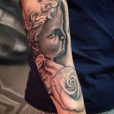 Located in se portland on division, new rose tattoo is the perfect place to get inked. Street City Tattoos On Twitter Added A Cherub Angel Above The Rose We Started With Filled The Space Nicely Done By Jr T Https T Co Aefo9ugdkf Https T Co Wgsxnfijgk