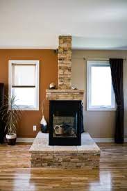 A chimney liner prevents combustible parts of a home from being exposed to the extremely hot. How To Decorate An Exposed Flue Pipe For A Gas Fireplace
