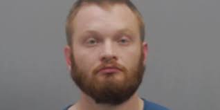 TQL worker fired, arrested after searching mass shootings online, bringing  gun to work: court doc