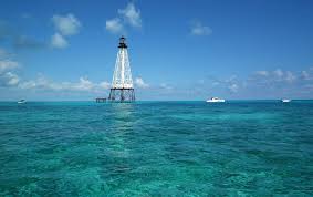 Photo about alligator reef lighthouse located just off the coast of the florida keys. Alligator Reef Lighthouse Photograph By Tammy Chesney
