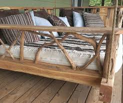 21 Ingenious Accessories To Deck Out Your Backyard Porch Swing Bed Rustic Porch Swing Porch Swing