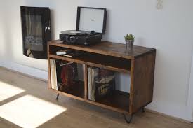 Reclaimed fir wood loaded with timeworn character is paired with sturdy metal for a rich blend of then and now. Industrial Tv Stand Vinyl Storage Unit Hairpin Leg Wood Furniture Tv Cabinet Turntable Lp Reclaimed Rustic Custom Turntable Furniture Vinyl Storage Industrial Tv Stand
