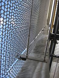 100m Stainless Steel Mesh Veil Acting As A Safety Screen Wood Lane Underground Station London Uk Steel Architecture Facade Design Facade Architecture
